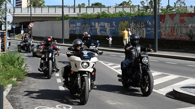 Harley riders wearing helmets