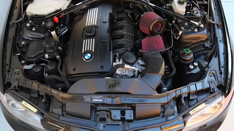 BMW N54 engine under the hood of a car