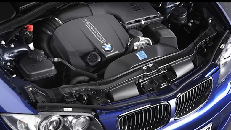 BMW N55 engine under the hood of a blue BMW