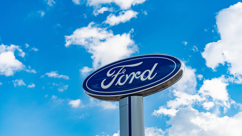 Ford logo against blue cloudy sky