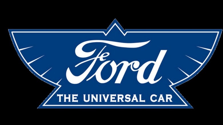 Ford's 1910's logo — an equilateral triangle with open bird-like wings on either side, and Ford in script across the middle.