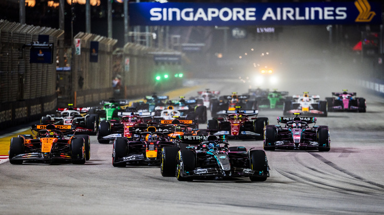 An F1 race event in Singapore with cars driving down the track