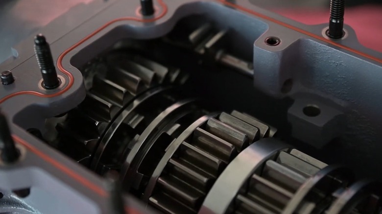 A Dog Box transmission opened up with gears visible