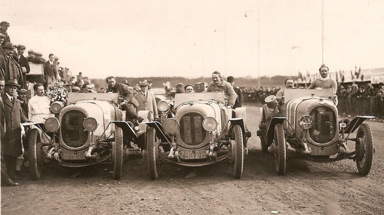 The No. 9, 11, and 10 Chenard-Walker racing cars at the inaugural 24 Hours of Le Mans race in 1923.