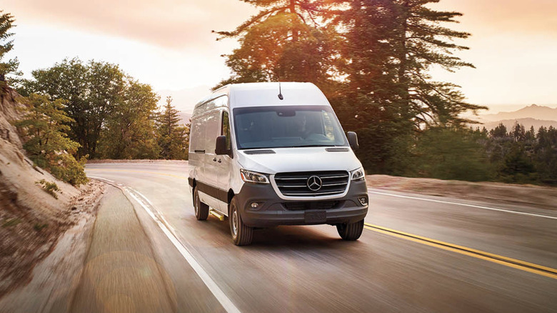 A Mercedes-Benz Sprinter Cargo van climbing a mountain pass