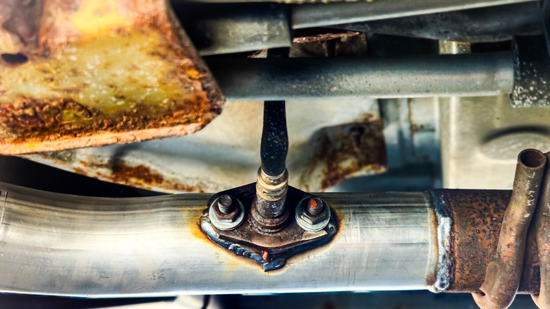 An oxygen sensor plugged into exhaust pipe