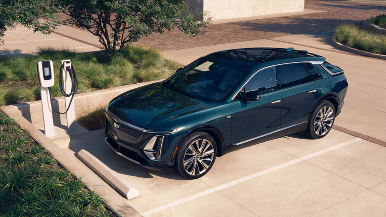 a blue 2025 Cadillac Lyriq parked in an EV charging station