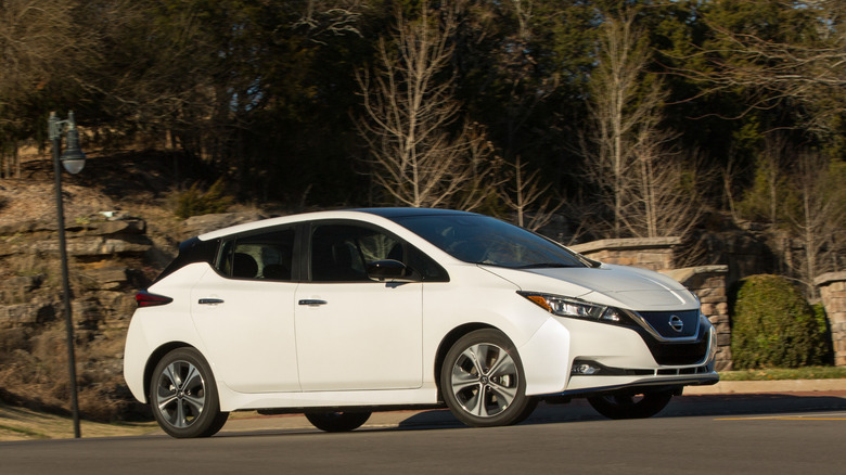 A white 2020 Nissan Leaf Plus SV parked on street