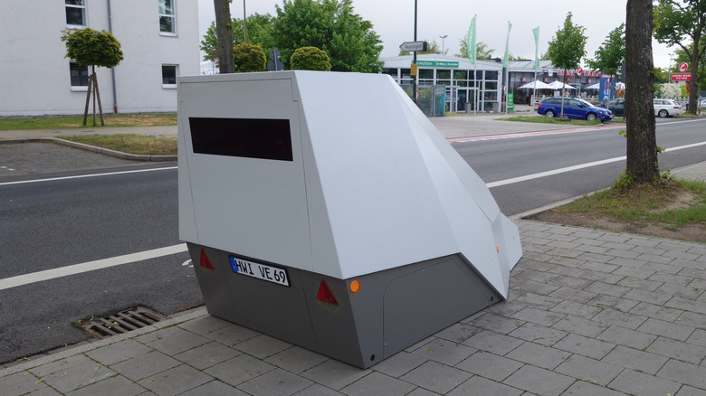 Vitronic Enforcement Trailer 2019 sits on sidewalk.