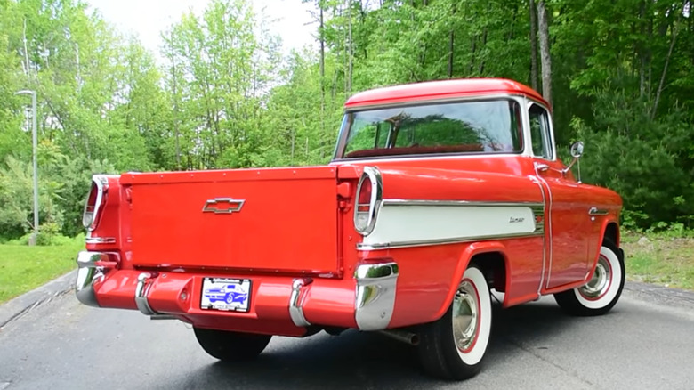 Rear 3/4 of white on red Chevrolet Cameo Carrier