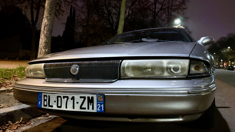 The front end of a last-generation Chrysler New Yorker in Europe of all places.