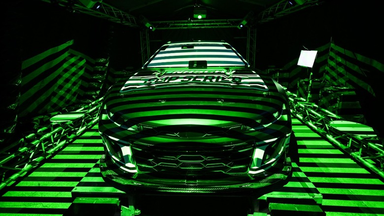 A stock car going through optical scanning inspection before a race.