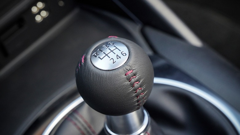 A closeup of a 2016 Miata's manual gear shifter