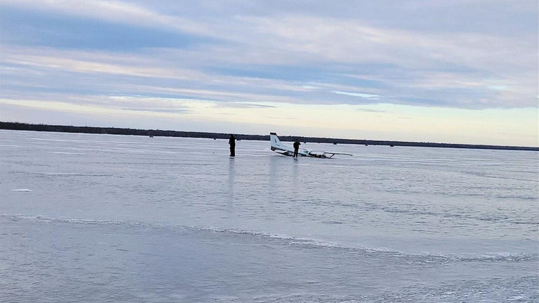 A photo of a Cessna 172 Skyhawk stuck in the ice of Upper Red Lake, Minnesota