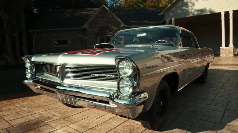 Front 3/4 of 1963 Pontiac Catalina Swiss Chees in sharp light