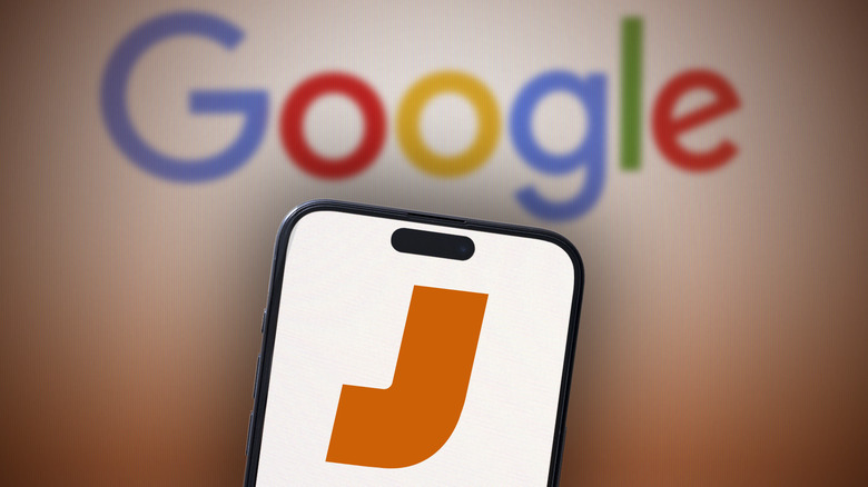 An iPhone showing a Jalopnik logo in front of Google's homepage