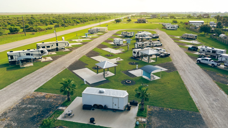 Various campers and RVs at an RV park