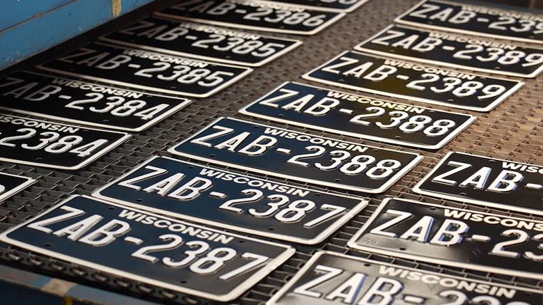 Blackout license plates being made and stamped