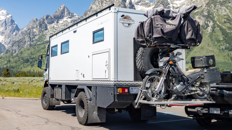 Motorcycle strapped onto an RV.