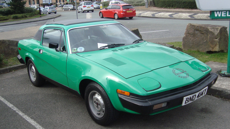 Front shot of a green 1977 Triumph TR7 Coupe