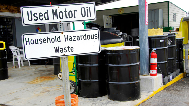 An area designated for used motor oil with metal drums