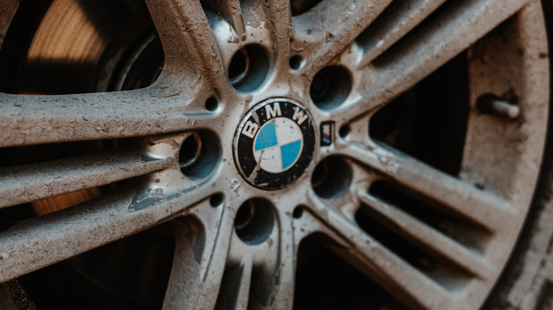 Close-up image of a dirty BMW wheel.