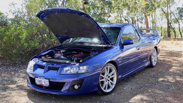 The front end of a blue VZ-generation HSV Maloo R8 ute