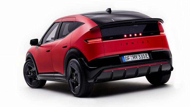 Rear 3/4 view of a red Hyundai Ioniq 3