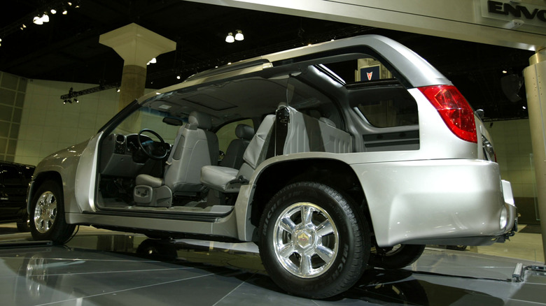GMC Envoy XUV cutaway showing the rear bed and retractable roof