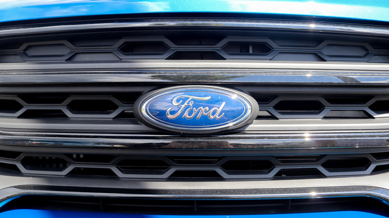 Kiel, Germany – July 15, 2020: Close up of the Ford logo on a new car front