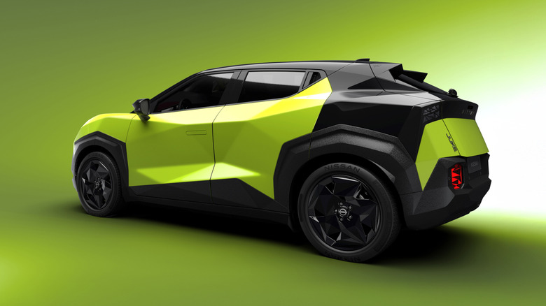 Rear 3/4 view of a green Nissan Juke EV