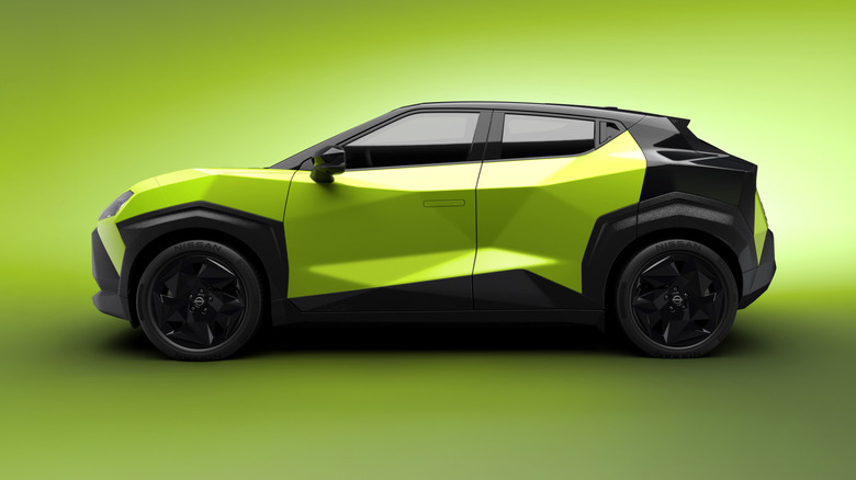 Side view of a green Nissan Juke EV