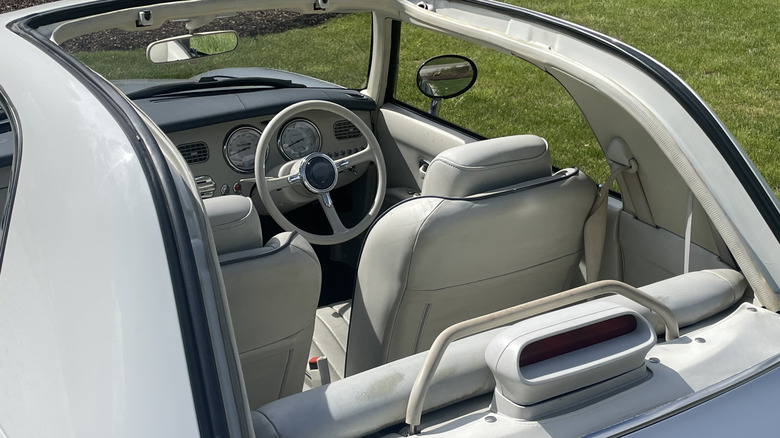 Nissan Figaro interior as viewed through the open top