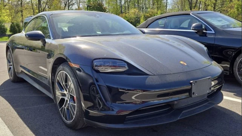 a black 2020 Porsche Taycan 4S parked in a parking lot