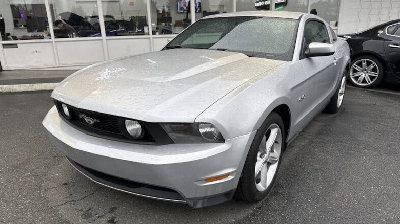 A silver 2011 Ford Mustang