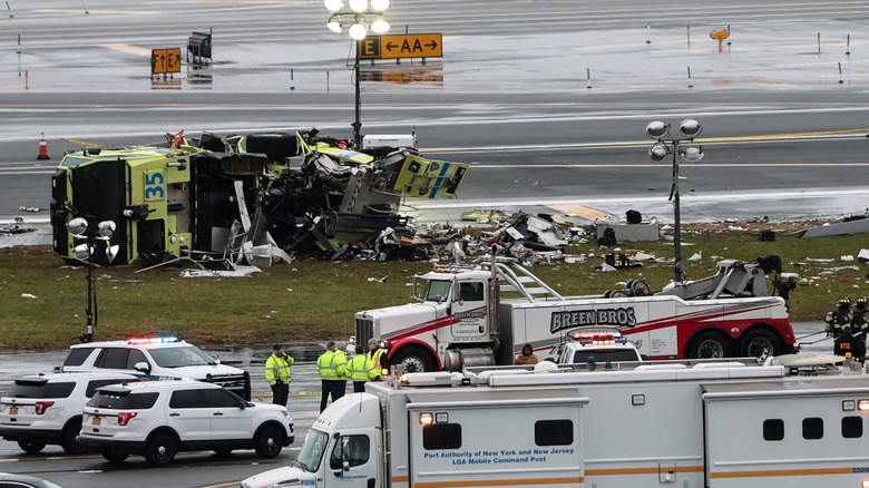 An a Port Authority occurrence motortruck sits connected nan runway aft colliding pinch an Air Canada Express CRJ-900 astatine LaGuardia Airport connected March 23, 2026 successful New York City.