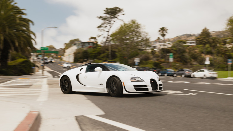 A white Bugatti Veyron Grand Sport Vitesse pulling into traffic