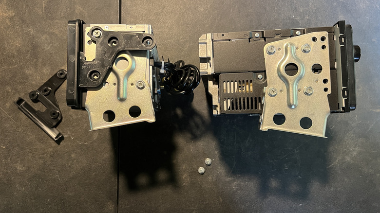 Side views of the original head unit and Apple CarPlay replacement, with the original bracket and a trim panel attached