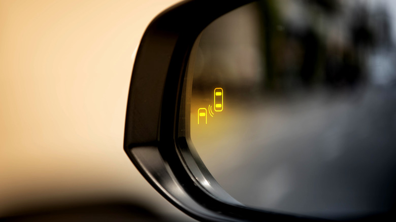 Blind-spot alert activated in car's sideview mirror