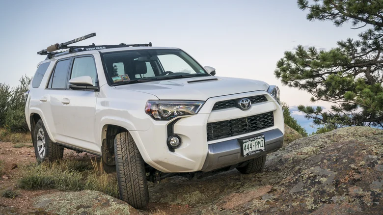 A Toyota 4Runner driving on a rocky trail.