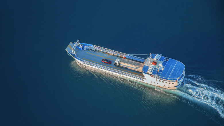 A RoRo ship carrying a car and truck