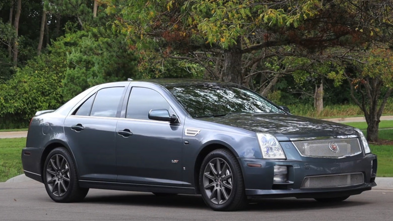 A parked gray Cadillac STS-V