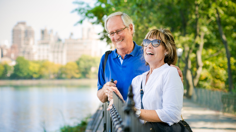 An older couple who still looks happy because NYC is walkable
