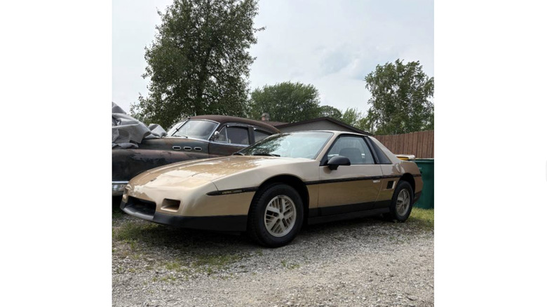 a gold pontiac fierro