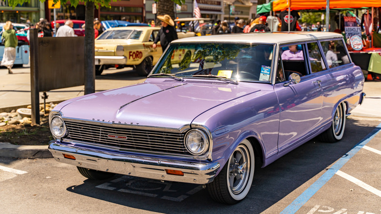 a purple chevy nova station wagon