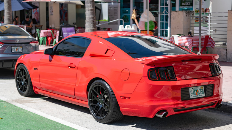 A Mustang GT parked at a car show