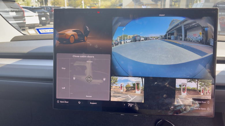 Screenshot: A Tesla Cybercab's touchscreen with the emergency "joystick" UI up.