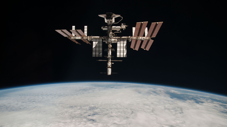 IN SPACE - MAY 23: In this handout image provided by the European Space Agency (ESA) and NASA, the International Space Station and the docked space shuttle Endeavour orbit Earth during Endeavour's final sortie on May 23, 2011 in Space. Italian astronaut Paolo Nespoli captured the first-ever images of an orbiter docked to the International Space Station from the viewpoint of a departing vessel as he returned to Earth in a Soyuz capsule. (Photo by Paolo Nespoli - ESA/NASA via Getty Images)
