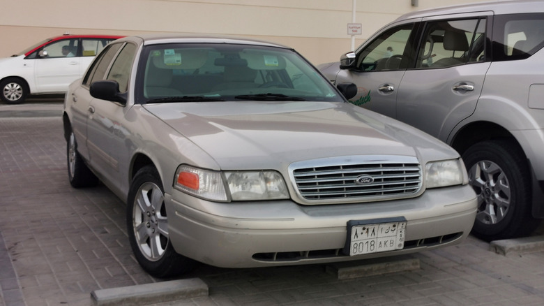 A silver P72 Ford Crown Victoria.