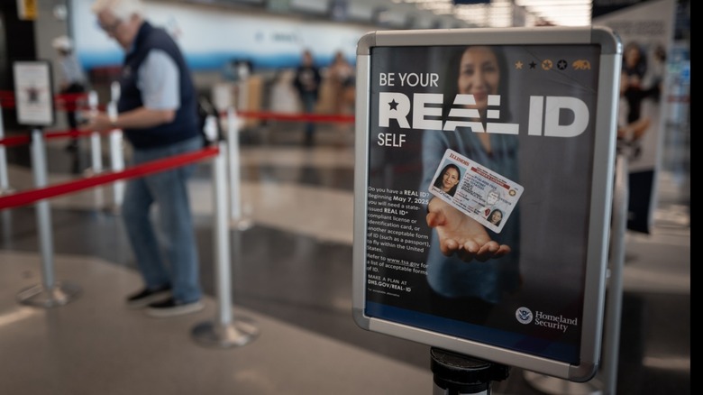 Sign explaining REAL ID at TSA line in airport